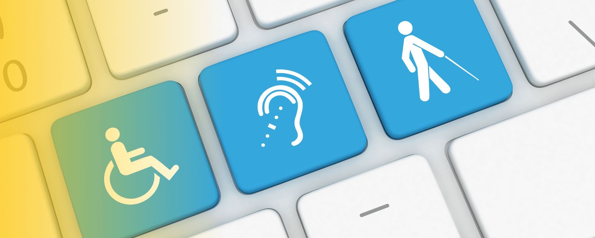 Tastatur mit Symbolen für Barrierefreiheit: Rollstuhl, Hörhilfe und Blindenstock auf speziellen Tasten. Symbolisiert digitale Barrierefreiheit und inklusives Design.
